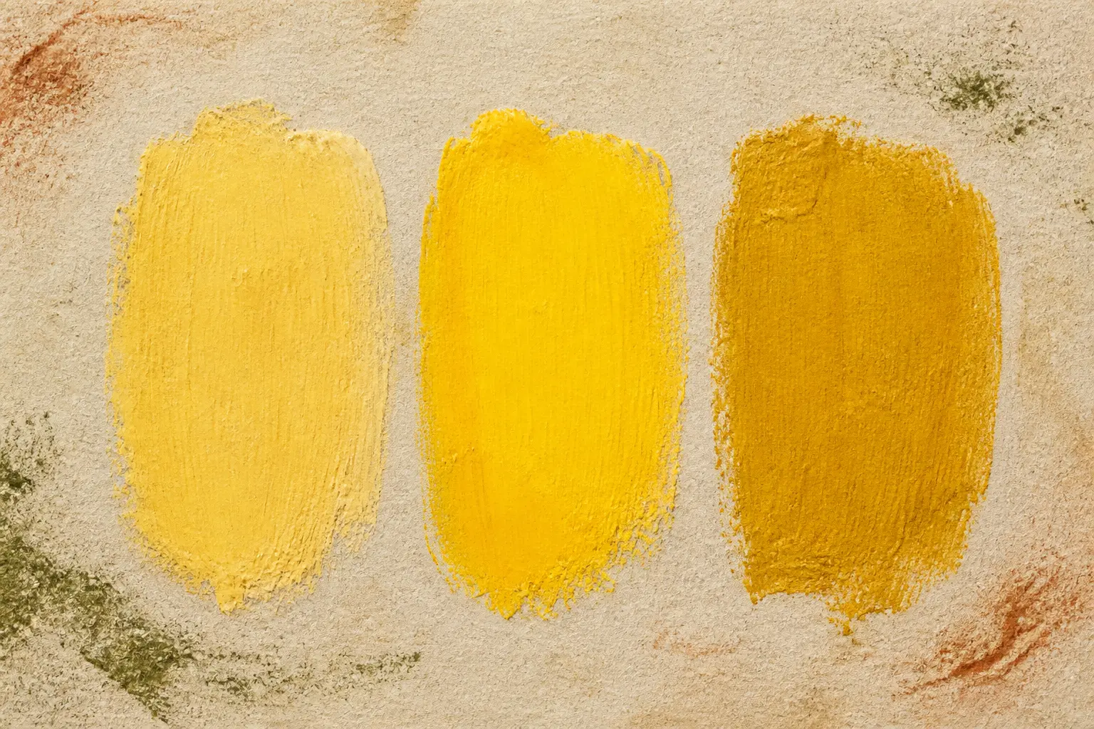 Trois swatches de nuance de jaune en aquarelle, du beurre clair à l’ocre chaud, avec textures mates visibles